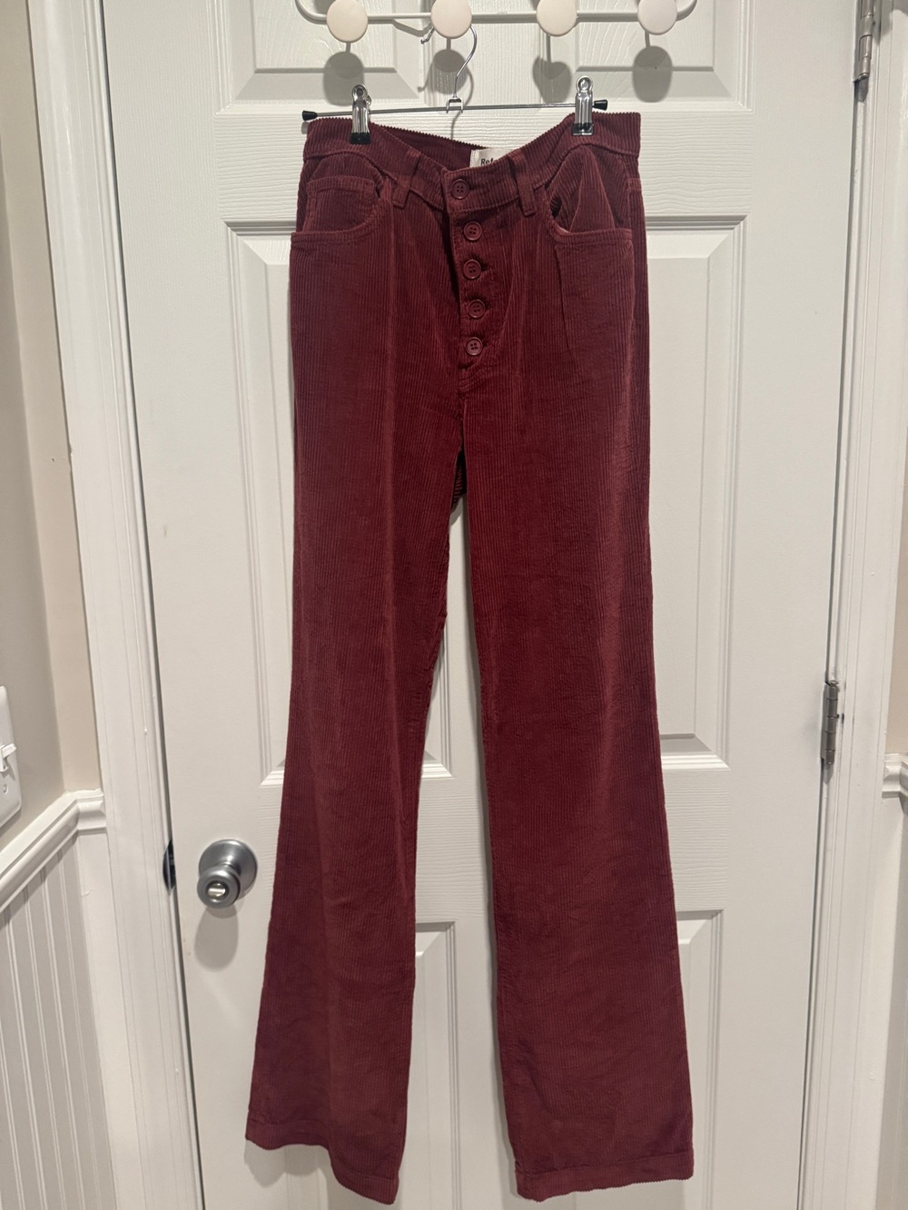 Reformation Corduroy Flare Jeans in Brick Red